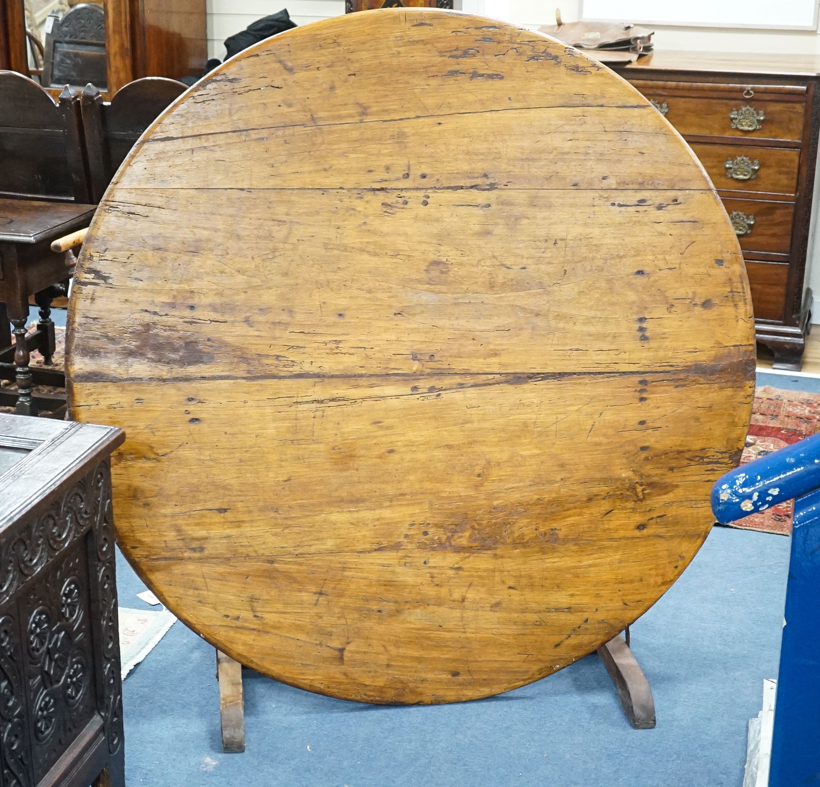 A Vendange 19th century fruitwood table, diameter 136cm, height 68cm